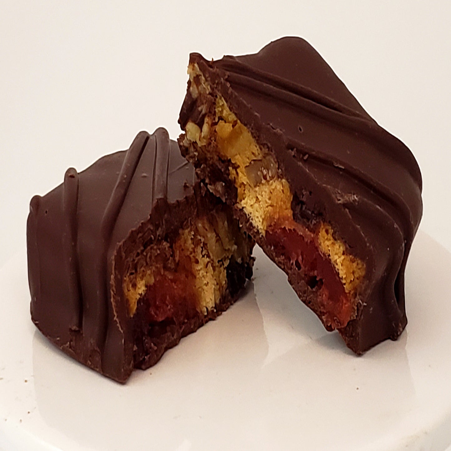 Chocolate Covered Fruitcake Slices in a Snowman Tin