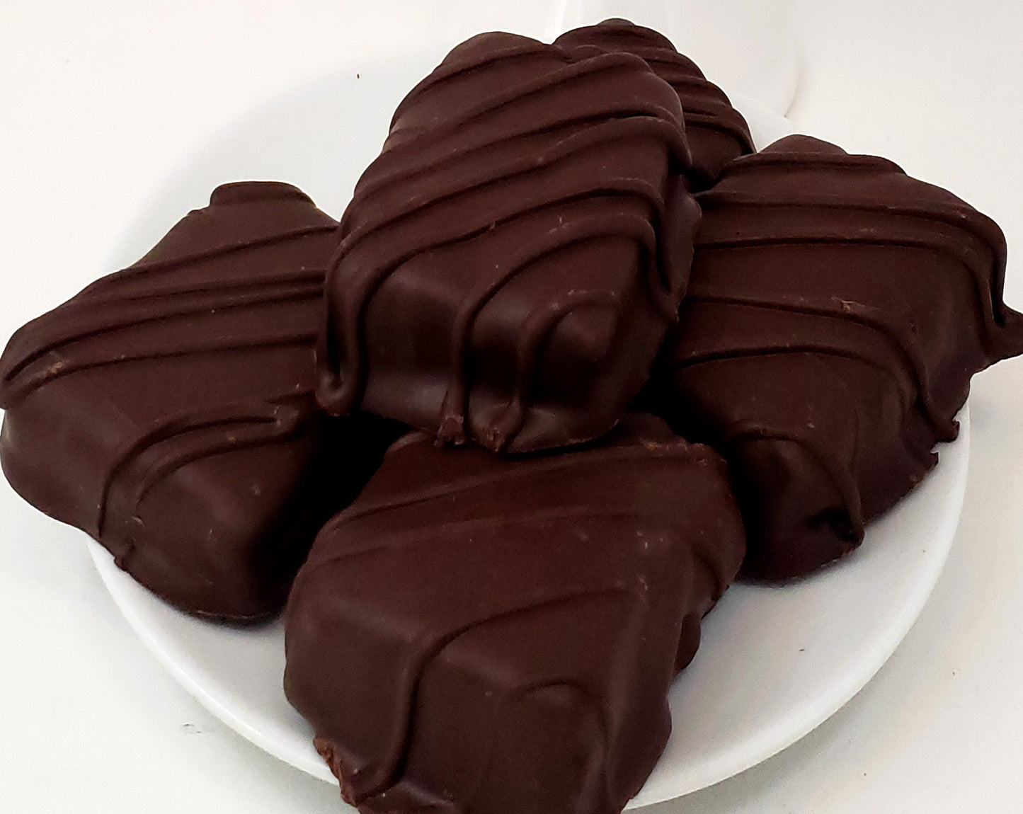 Chocolate Covered Fruitcake Slices in a Snowman Tin