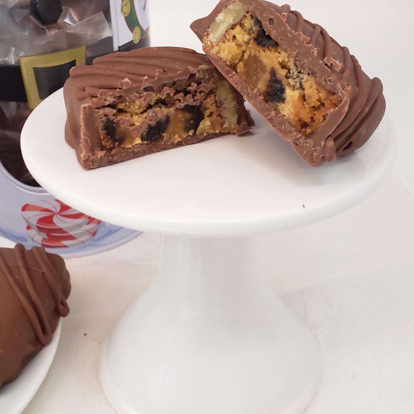 Chocolate Covered Fruitcake Slices in a Snowman Tin